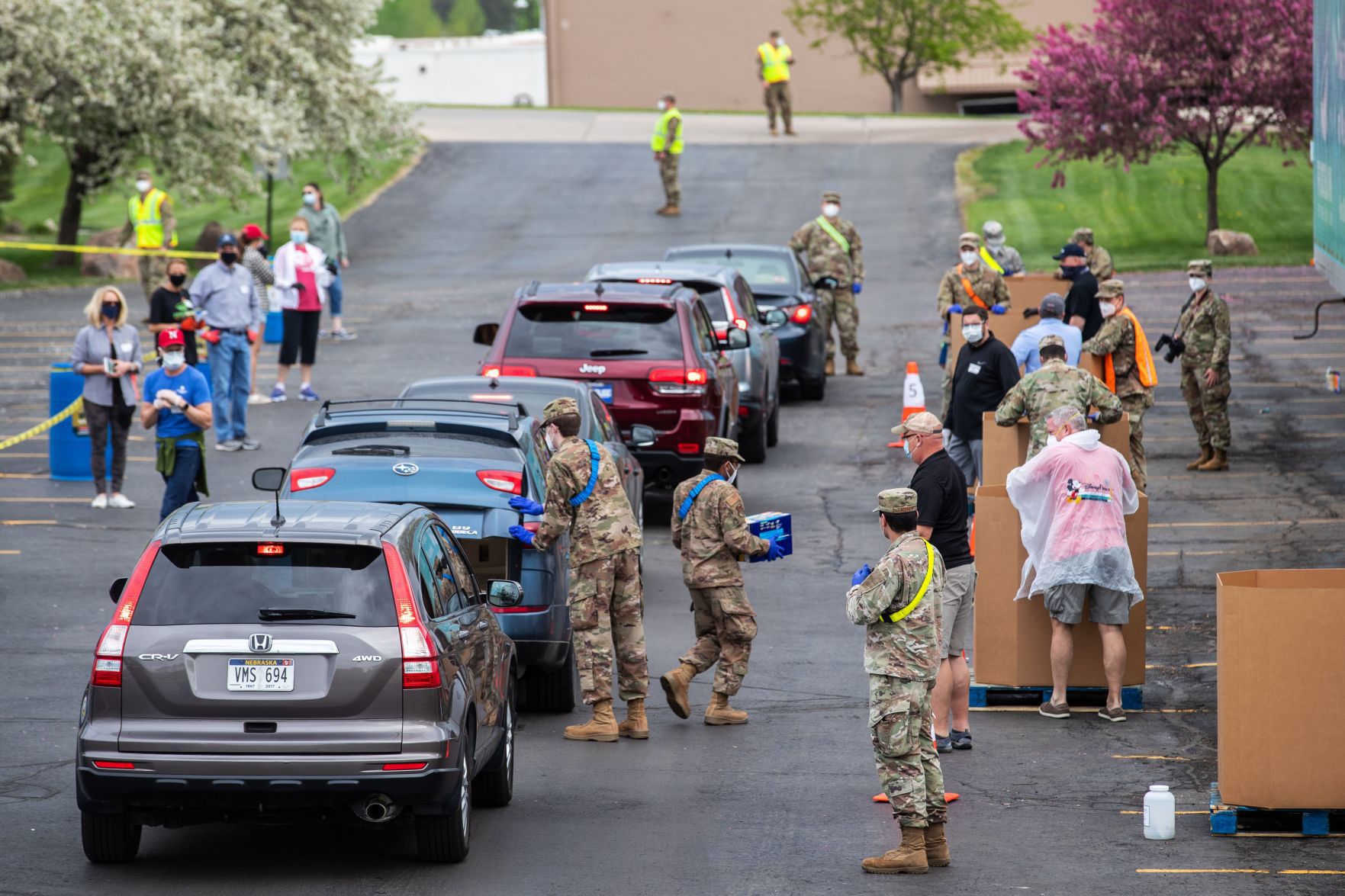 Nebraska National Guard helps with 'social distancing drive-thru food drive' (copy)